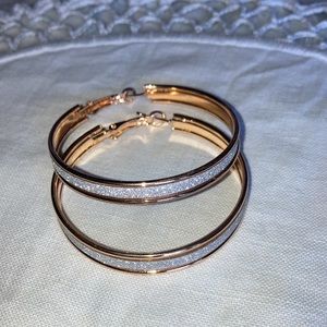 NWOT Gt post hoop earrings, gt w/ 1/4” appx. glitter center, dia. appx. 2”. $19